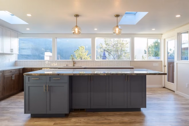a kitchen island with lower cabinets
