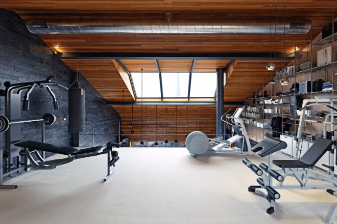 A luxurious home gym in an attic