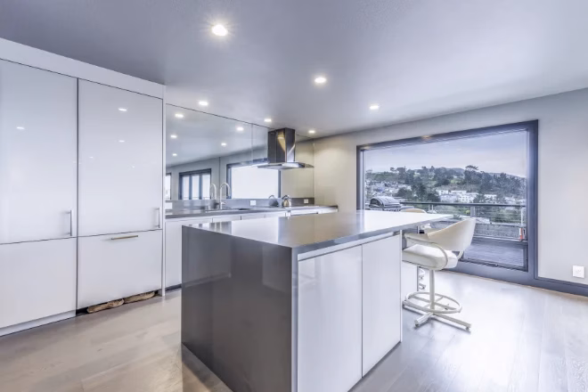 A luxurious kitchen with modern appliances and cabinets