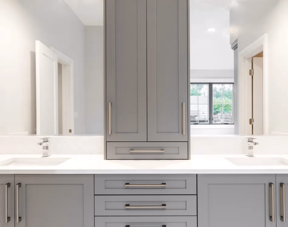 Bathroom with gray cabinets