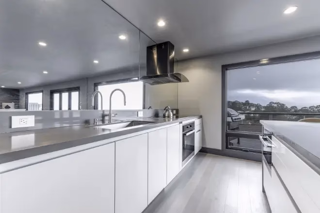 Custom-cabinets-can-feature-premium-enhancements-like-pull-out-drawers-and-hidden-outlets