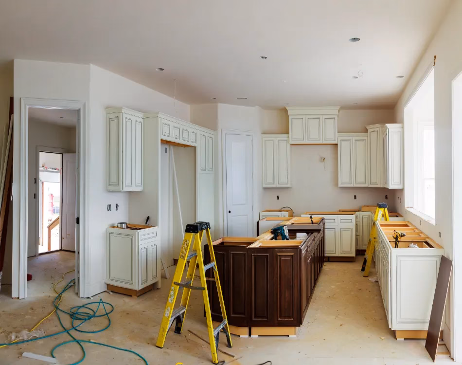 Custom kitchen cabinets in various stages of installation