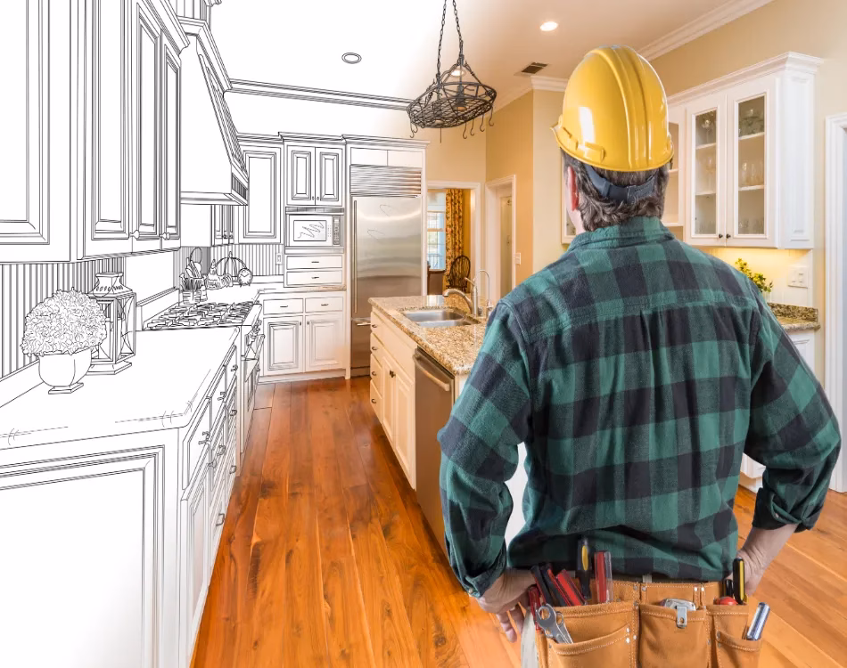 Male Contractor with Hard Hat and Tool Belt Looking At Custom Kitchen Drawing Photo Combination
