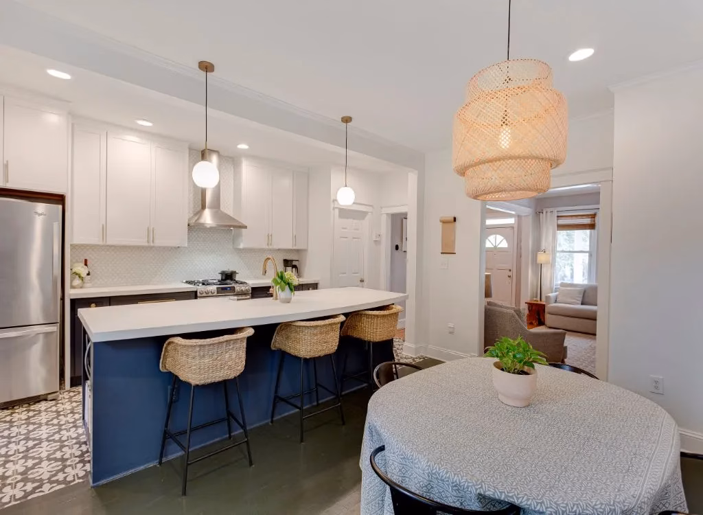 Orb pendant lights over island