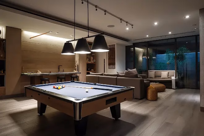 a game room with a pool table